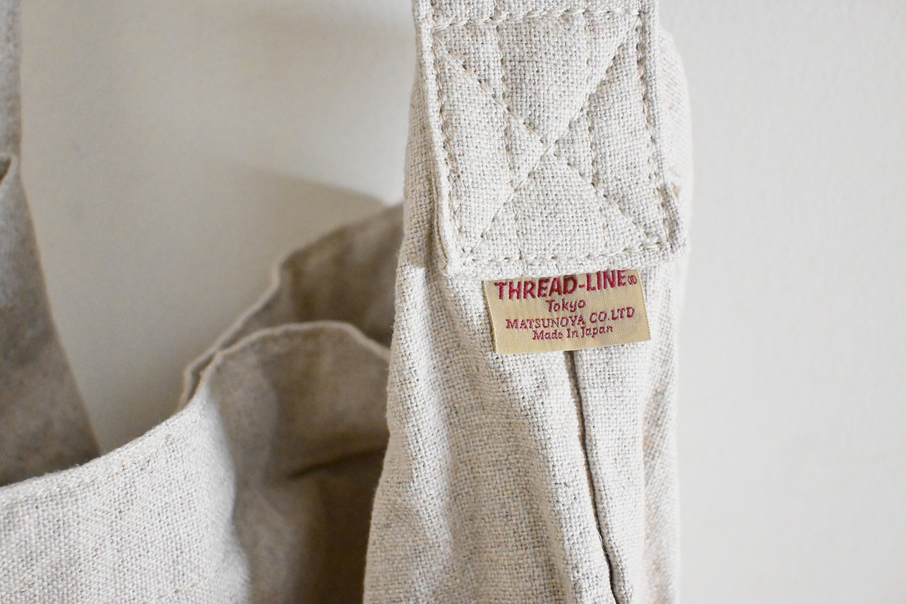 リネンコットンフラットショルダーポケット付